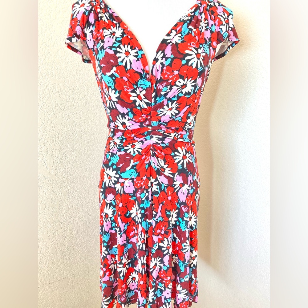 Floral dress Free People deep V neck mini dress body con chest and flair skirt